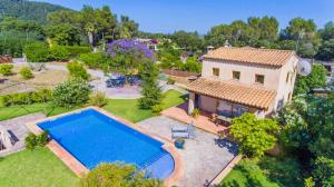 an aerial view of a house with a swimming pool at Casita Luisa in Crestatx