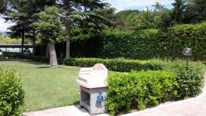 A garden outside Lido Azzurro Residence rta