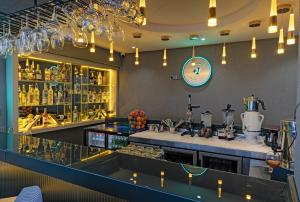 a bar at a restaurant with a counter at Çandarlı Resort Otel in Dikili