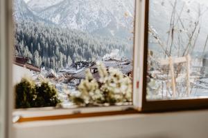 Fotografie z fotogalerie ubytování Dependance Siera presso Borgo Antico Mountain Lodge v destinaci Sappada