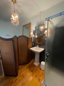 a bathroom with a sink and a mirror at Villa San Giovanni in Villafranca dʼAsti +58 photos