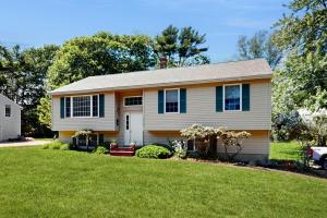 a house with a green lawn in front of it at The Lucky Lobster in York