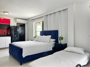 Ένα ή περισσότερα κρεβάτια σε δωμάτιο στο Loft con vista al mar 2