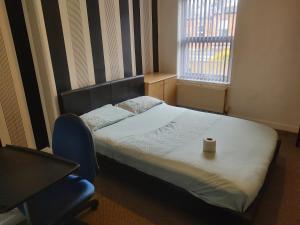 Katil atau katil-katil dalam bilik di ref Os, Best rooms near City Centre, University & QMC