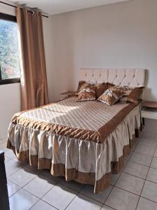 Ένα ή περισσότερα κρεβάτια σε δωμάτιο στο Apartamento na serra