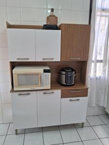 Η κουζίνα ή μικρή κουζίνα στο Apartamento na serra +11 φωτογραφίες