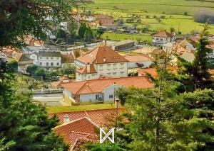a view of a town with houses and trees at MyStay - Casa Aguarela in São Romão