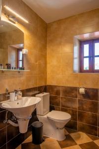 a bathroom with a toilet and a sink at Old Town Church Bells in Kotor +12 photos