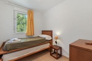 Ένα ή περισσότερα κρεβάτια σε δωμάτιο στο Infinity View Apartment Menorca +22 φωτογραφίες