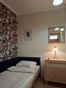 Ένα ή περισσότερα κρεβάτια σε δωμάτιο στο Apartman Termál