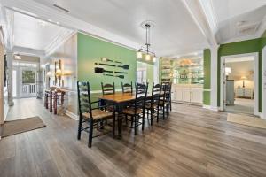 a dining room with a table and chairs at Ruthie's Roost villa by Peace Vacations in Georgetown +20 photos