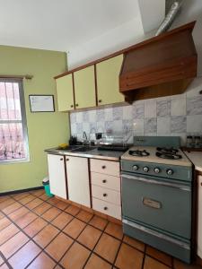 Η κουζίνα ή μικρή κουζίνα στο Dpto Aceituna +9 φωτογραφίες