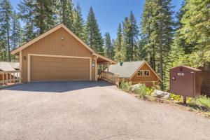a house with a garage and a driveway at Jester Court home in Tahoe Vista