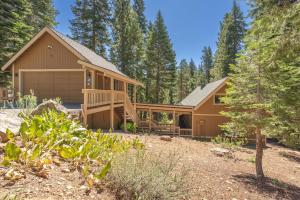 a house in the woods with a yard at Jester Court home in Tahoe Vista +30 photos