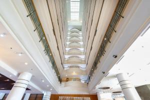 a view of the ceiling of a building at Garden Plaza Saigon - Formerly PARKROYAL Saigon in Ho Chi Minh City