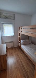 En eller flere senge i et værelse på Appartement Villar d'arène