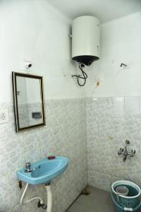 Un baño de Mountain Villa Ooty Rooms 36 fotos más