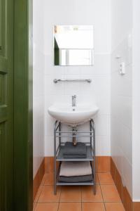 a bathroom with a sink and a mirror at Bedřichov U Nás in Bedřichov