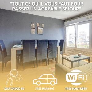 a dining room with blue chairs and a table at Le cocon Champenois-Parking, centre & Tram in Reims