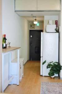 Η κουζίνα ή μικρή κουζίνα στο home story in Tokyo Okubo 東京屋語 in 新大久保 新宿