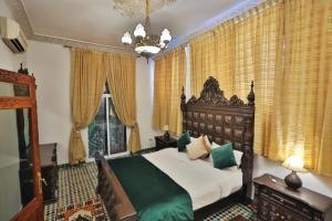 Ένα ή περισσότερα κρεβάτια σε δωμάτιο στο Spacious Apartment in Fès with Private Pool, 150 sqm +28 φωτογραφίες
