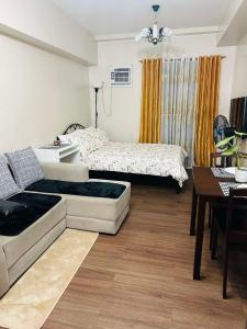 Ένα ή περισσότερα κρεβάτια σε δωμάτιο στο Laverti residences