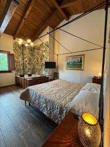 Postel nebo postele na pokoji v ubytování La Cascina rooms