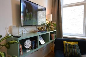 TV a/nebo společenská místnost v ubytování Brightside