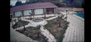 una vista aérea de una casa con piscina en Melek villa, en Gabala