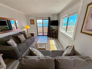 TV a/nebo společenská místnost v ubytování Inlet Point Villas 4C