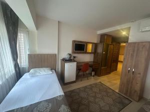 Η κουζίνα ή μικρή κουζίνα στο Atlantik Butik Hotel