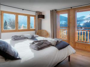 Ένα ή περισσότερα κρεβάτια σε δωμάτιο στο Chalet Manoe - OVO Network