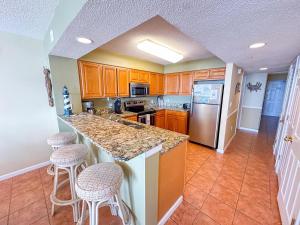 Kuchyň nebo kuchyňský kout v ubytování Ashworth 1303