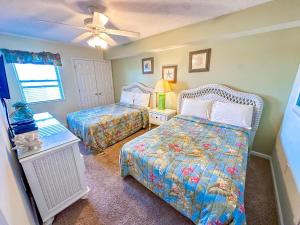 Postel nebo postele na pokoji v ubytování Ashworth 1303 + 37 fotografií