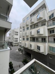 an apartment building viewed from the balcony at Luxurious Penta Square Theatre Apartment DHA P5 in Lahore