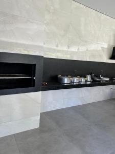 Køkken eller tekøkken på Residência Vale do Araguaia