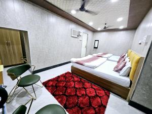 Postel nebo postele na pokoji v ubytování Kanchan Bhawan Grand Heritage