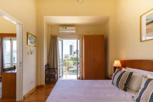 Ένα ή περισσότερα κρεβάτια σε δωμάτιο στο Central Penthouse Sky Suite