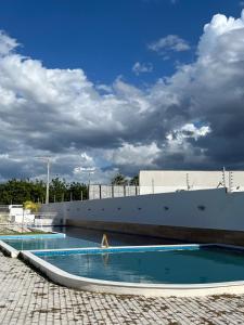 a large swimming pool on top of a building at Casa de aluguel por temporada in Parnaíba