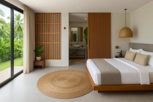 Postel nebo postele na pokoji v ubytování Ceylonry Life Boutique Villa