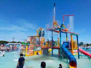 a water park with people playing in the water at JUN RESORT HOTEL - Vacation STAY 03681v in Hasunuma