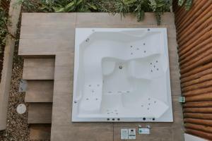 戈亚斯州上帕莱索Vila Astra - jacuzzi gigante, telão 120 polegadas, próximo de tudo的花园浴缸的鸟瞰图