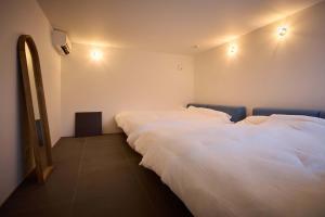 Кровать или кровати в номере tuuli YUFU Kei-KEI- [Leisurely] - Vacation STAY 52352v