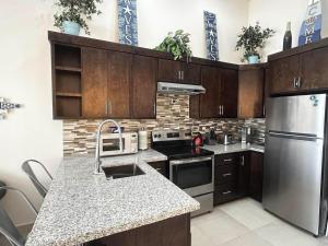 Η κουζίνα ή μικρή κουζίνα στο Buenos Aires Villa 6