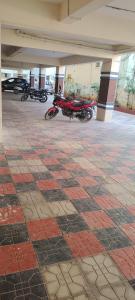 a group of motorcycles parked inside of a building at Vaarahi Enclave Kondapur in Hyderabad