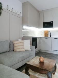 a living room with a couch and a coffee table at La Bella Riva in Sarnico
