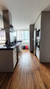 Η κουζίνα ή μικρή κουζίνα στο Apartamento Bem Localizado Batel +5 φωτογραφίες