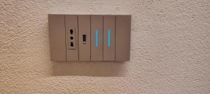 an electrical outlet on the side of a wall at Antica Fontana in Bernezzo