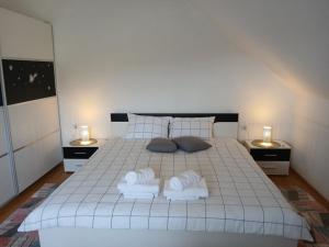 Postel nebo postele na pokoji v ubytování Apartman Skender 3* Ravna Gora