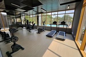 a gym with treadmills and cardio machines in it at Today Perdizes - Novo e sofisticado, em frente ao Allianz Parque in Sao Paulo